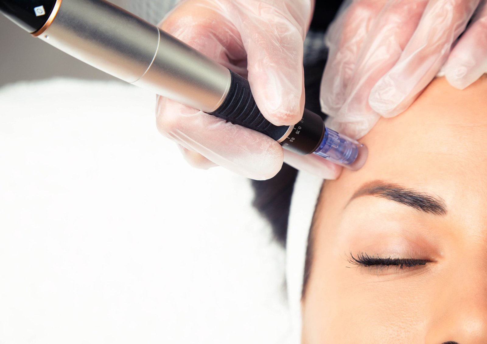 Shot of cosmetologist making mesotherapy injection with dermapen on face for rejuvenation on the spa center.; Shutterstock ID 1657904122; purchase_order: -; job: -; client: -; other: -