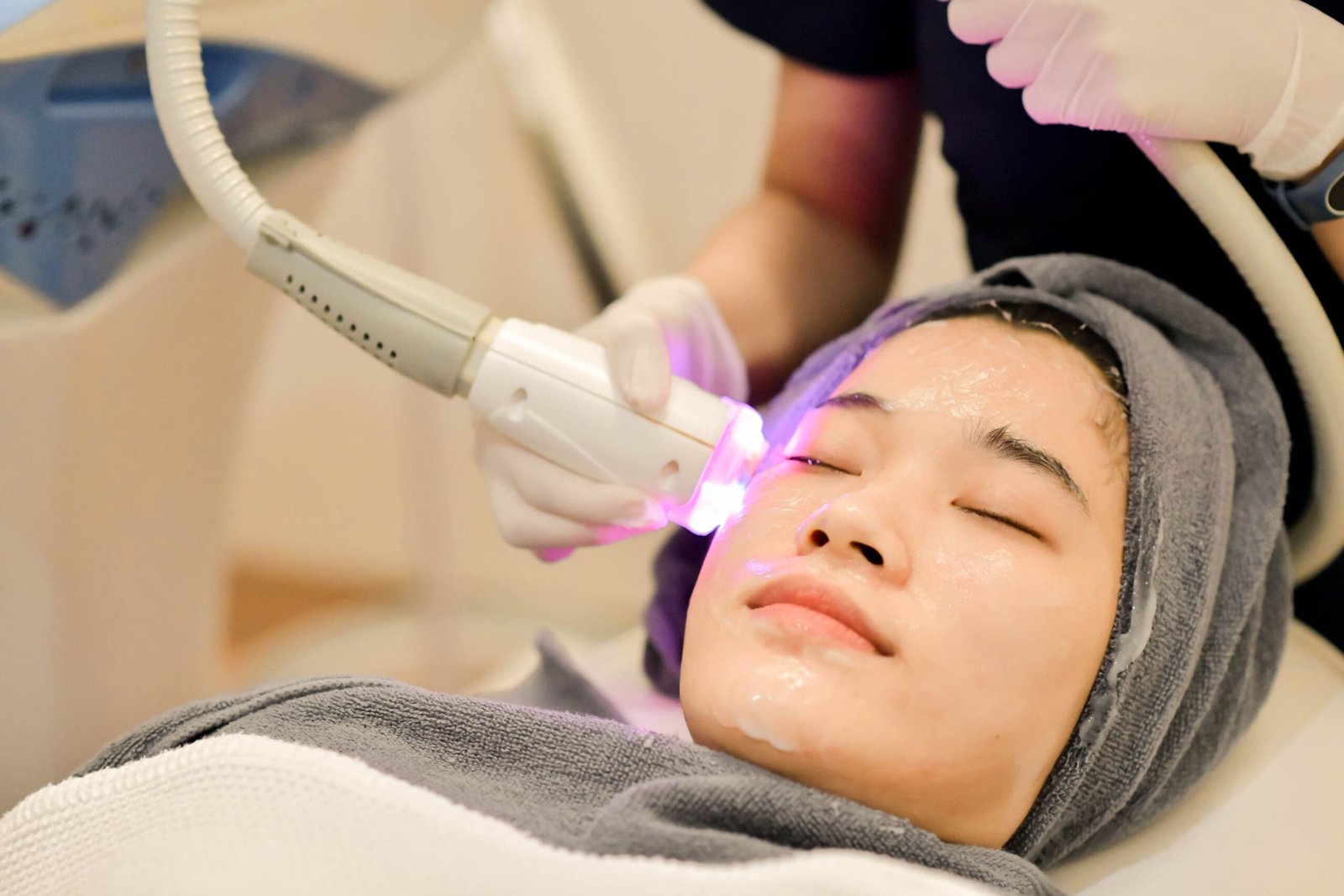 Closeup Of Beautician Using Laser Therapy For Facial Skin Rejuvenation. Beautiful Healthy Woman Face Getting Skin Resurfacing In Spa Salon.; Shutterstock ID 1915421989; other: -; purchase_order: -; client: -; job: -