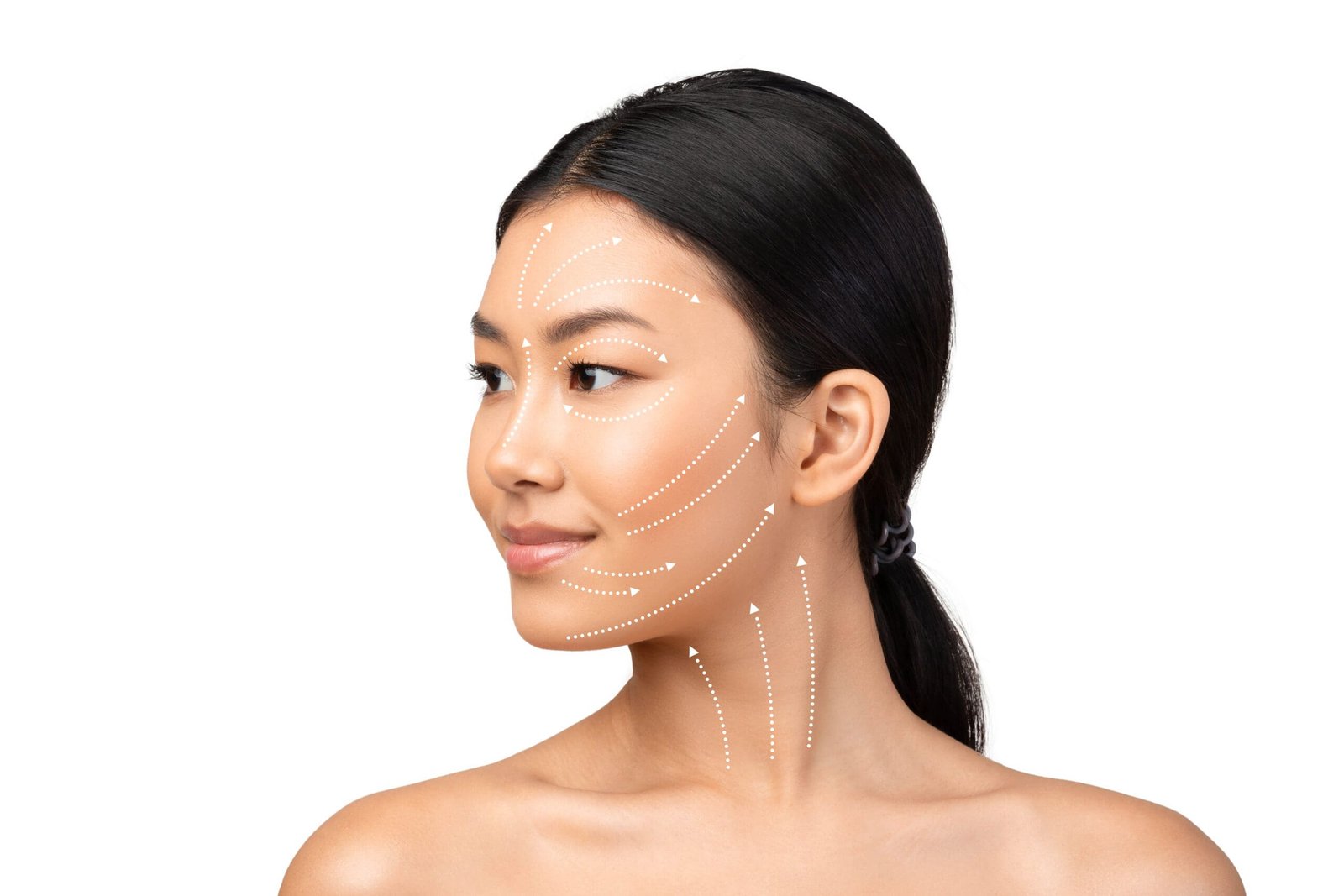 Asian Woman's Face Portrait With Lifting Arrows Showing Antiaging Facial Skincare Treatment, Headshot On White Studio Background, Looking Aside. Ageless Beauty And Plastic Surgery Concept; Shutterstock ID 2300535369; title_of_publication: -; other: -; isbn: -; your_name: -